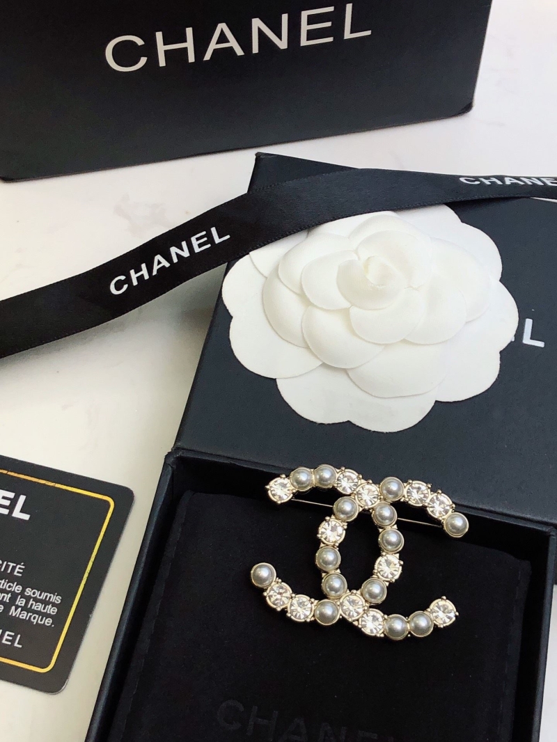 Ch**el brooches